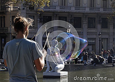 Man making soap bubbles Editorial Stock Photo