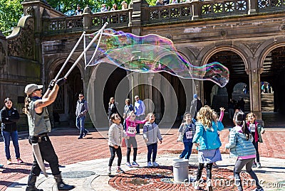 Man making soap bubbles Editorial Stock Photo