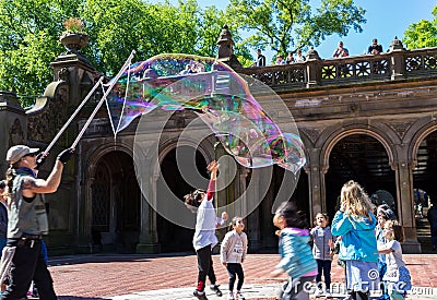 Man making soap bubbles Editorial Stock Photo