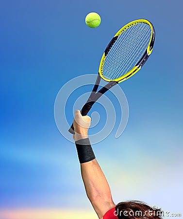 Man Making a Tennis Serve Stock Photo