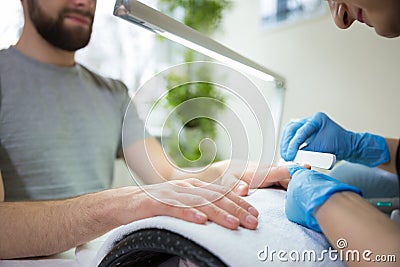 Man during manicure Stock Photo