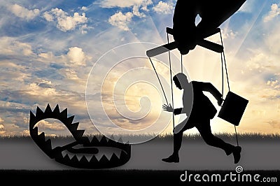 Man marionette running into a trap Stock Photo