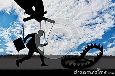 Man marionette running into a trap Stock Photo