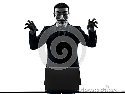 Man masked anonymous group member computing computer menacing si Editorial Stock Photo