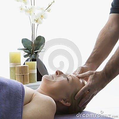 Man massaging woman. Stock Photo