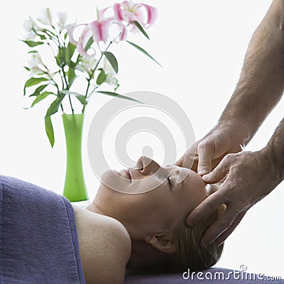 Man massaging woman. Stock Photo