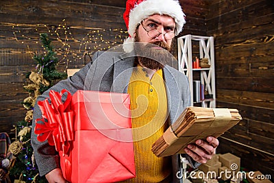 Man mature bearded with eyeglasses received post for santa. Gifts delivery service. Letter for santa claus. Post for Stock Photo