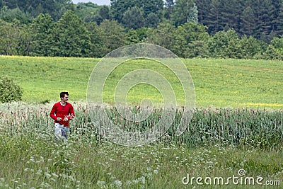 Man in the meadow Stock Photo