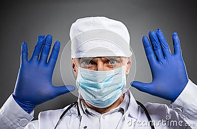 Man medic wearing protective medical mask. Covid-19 prevention Stock Photo