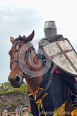 Man in a medieval historical clothes on horseback Editorial Stock Photo
