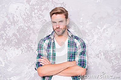 Man among men. barbershop concept. mens sensuality. sexy guy casual style. macho man grunge background. male fashion Stock Photo