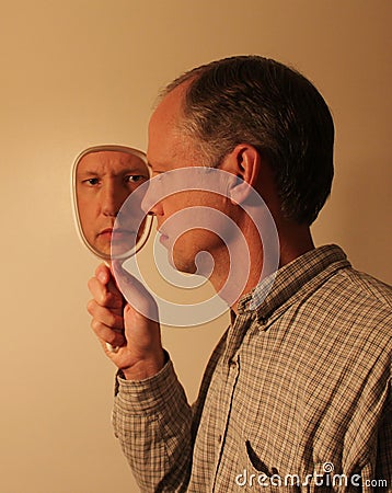 Man in the mirror Stock Photo