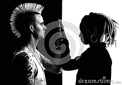 Man with Mohawk and Woman with Dreadlocks Stock Photo