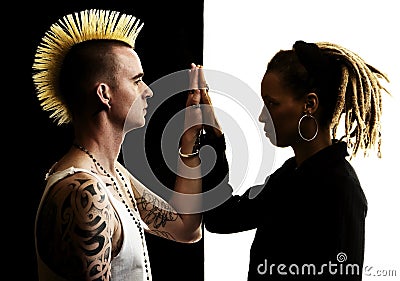 Man with Mohawk and Woman with Dreadlocks Stock Photo