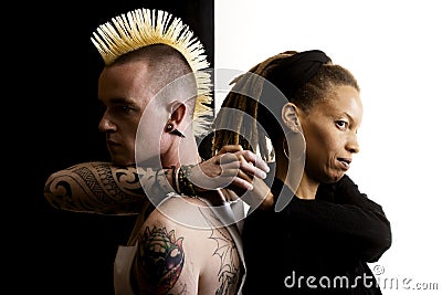 Man with Mohawk and Woman with Dreadlocks Stock Photo