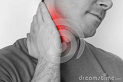 Man with muscle injury having pain in his neck Stock Photo