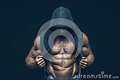 Man with muscular torso. Strong Athletic Men Stock Photo