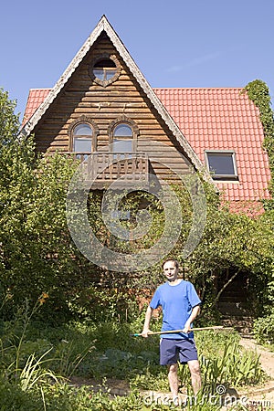 Man near country house Stock Photo