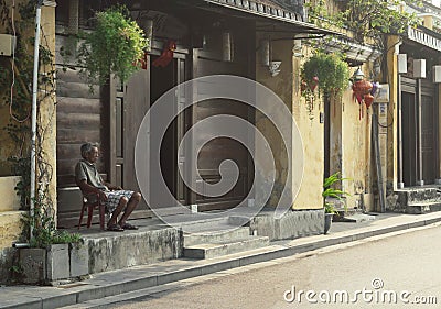 A Man Observes Hoi An in the early morning Editorial Stock Photo