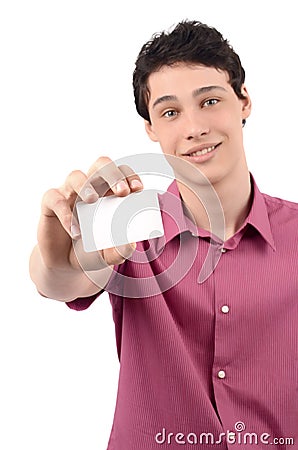 Man offering you a business card.Blur on the model, focus on the card. Stock Photo