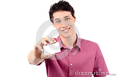 Man offering you a business card.Blur on the model, focus on the card. Stock Photo