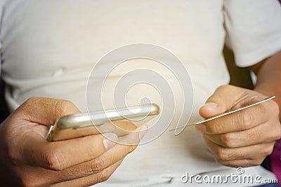 Man online banking using smartphone shopping online with credit Stock Photo