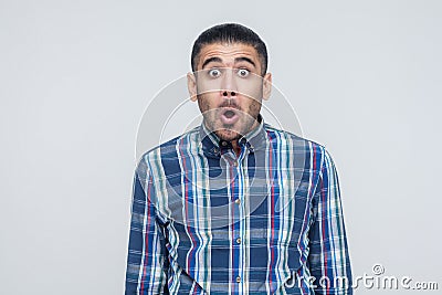 Man opened mouth and scream. Have a shocked face and big eyes. Stock Photo