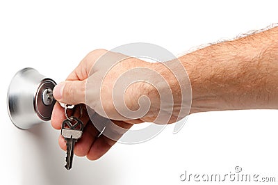 Man Opening Deadbolt Lock with Keys Isolated on White Stock Photo