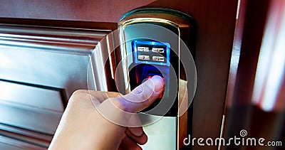 Man opening the door with fingerprint Stock Photo