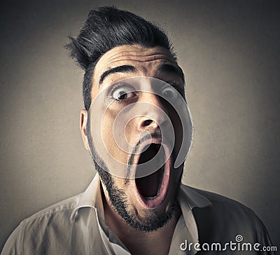 Man opening his mouth Stock Photo