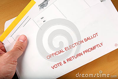 Man opening mail in ballot Stock Photo