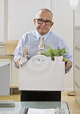 Man Packing up Belongings Stock Photo