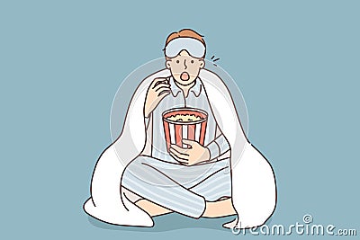 Man in pajama eat popcorn watch movie Vector Illustration