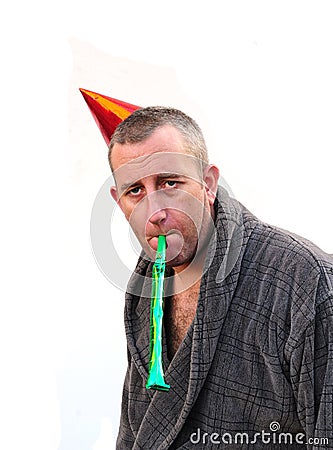 Man in party hat Stock Photo