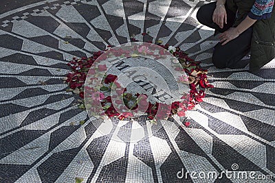 Man pays tribute to john lennon on mosaic memorial in central pa Editorial Stock Photo