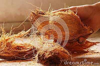 man peeling coconut Stock Photo