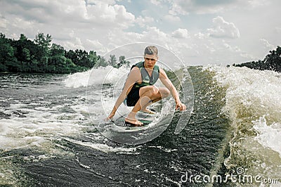 man performs his professional abilities and skills with wakeboard Stock Photo