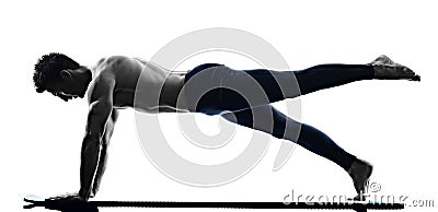 Man pilates exercises fitness isolated Stock Photo