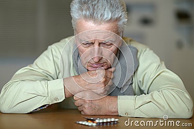Man with pills Stock Photo