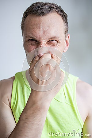 Man Pinches Nose Looks With Disgust Something Stinks Bad Smell Stock Photo