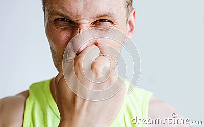 Man Pinches Nose Looks With Disgust Something Stinks Bad Smell Stock Photo