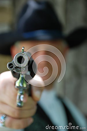 Man with pistol Stock Photo