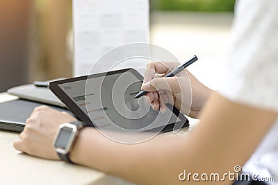 Man planning agenda and schedule using calendar event planner. Man hands using plan to vacation on laptop computer. Calender Stock Photo