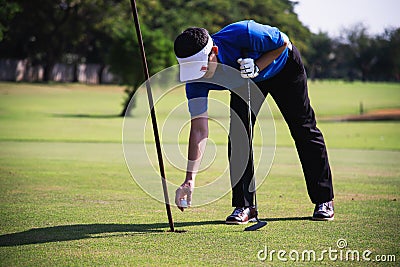 Man play outdoor golf sport activity Stock Photo