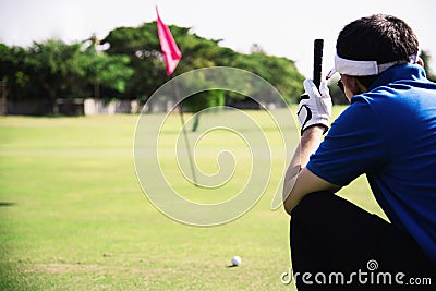 Man play outdoor golf sport activity Stock Photo