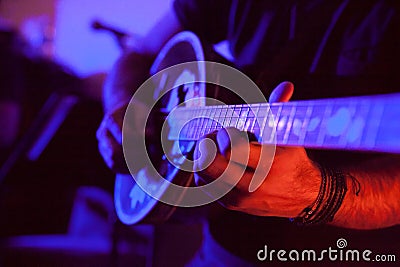 Man playing bouzouki Stock Photo