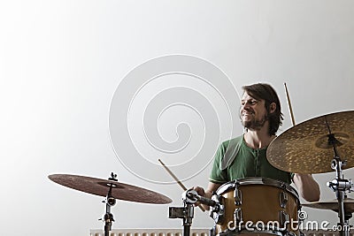 Man Playing Drum Set Stock Photo