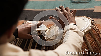Man playing a Drum or Tabla Stock Photo