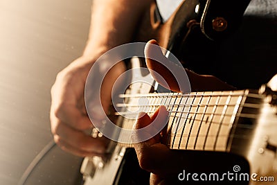 Man playing electric guitar Stock Photo