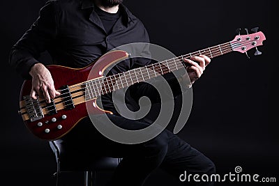 Man Playing Five String Bass Stock Photo